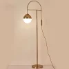 Sleek Gold Floor Lamp