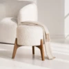 Greta Round Boucle Ottoman with Splayed Wood Legs - luxury furniture Dubai UAE
