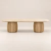 Shop the Travertine dining table: an organic freeform travertine top on two sculptural wood pedestals. W130 cm. Warm, natural luxury. Order today.