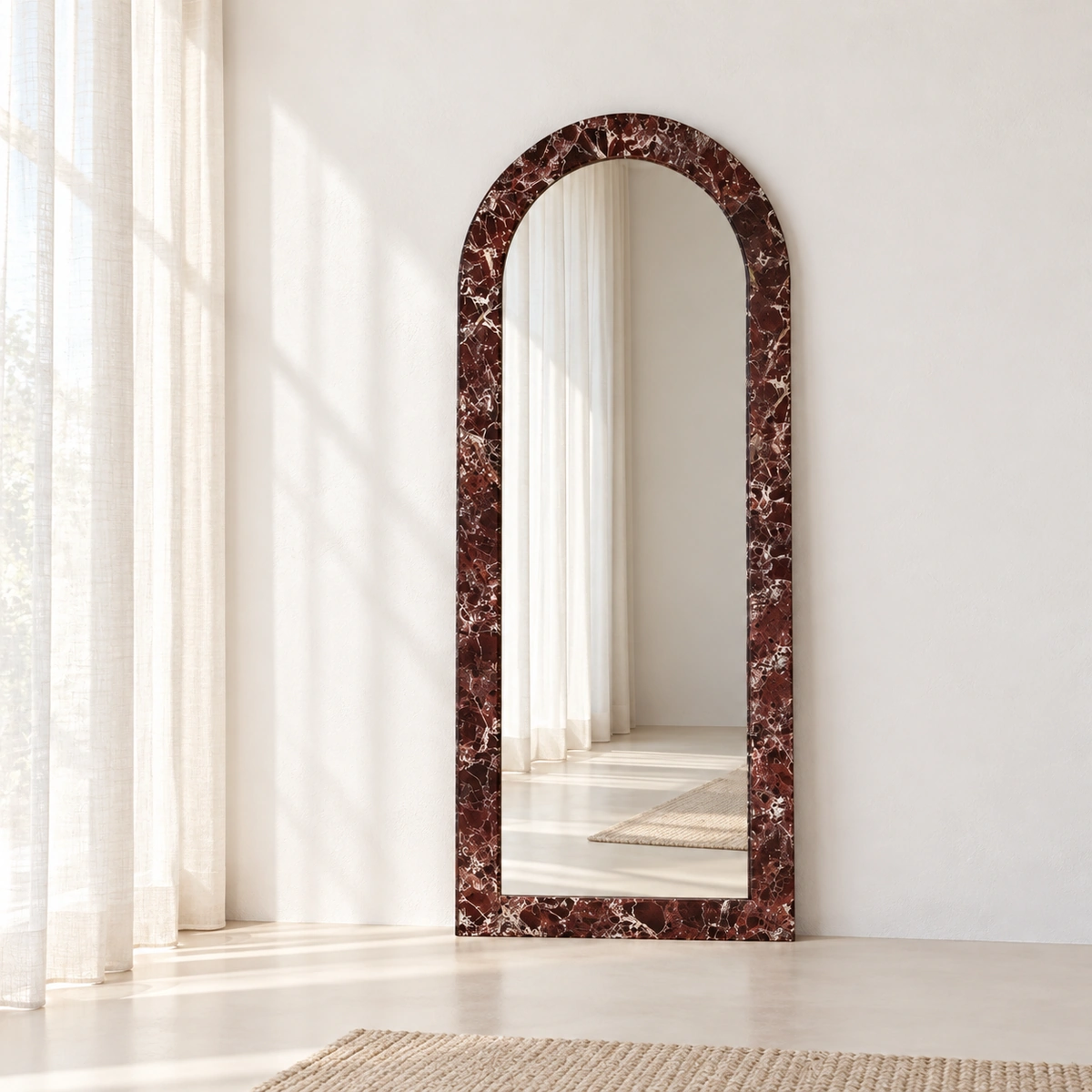 FIOLA burgundy marble-look arched mirror.