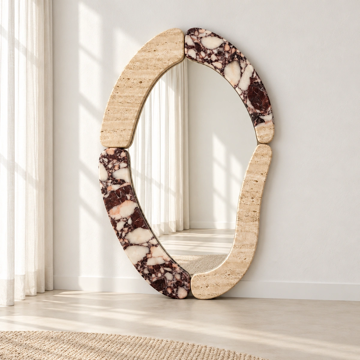AURA mirror with a travertine and marble frame.